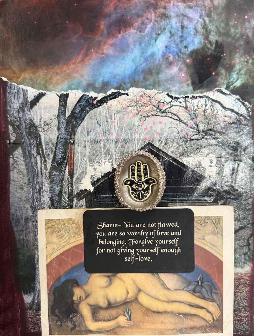 Collage of a hamsa charm and a card reading “Shame: You are not flawed, you are so worthy of love and belonging,” over bare trees, a galaxy and a reclining figure.