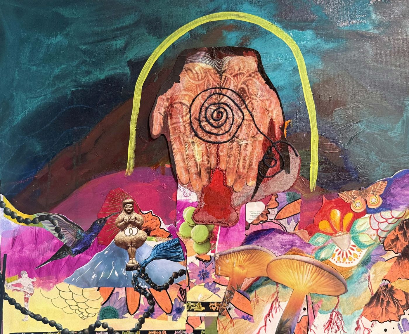 Collage of hennaed hands under a yellow arch, above a dreamlike band of mushrooms, birds and flowers lettered “feeling all the feelings.”