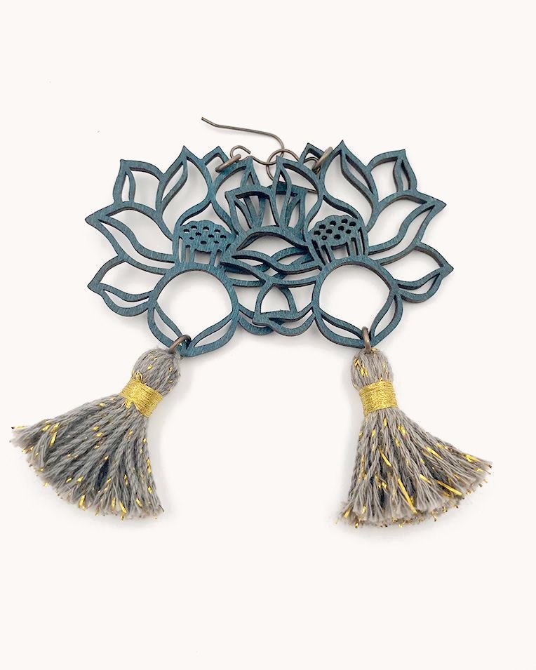 Slate lotus earrings with grey tassels.
