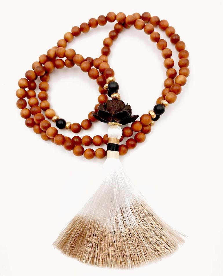 Wood bead mala with a small Buddha and a white-to-tan ombre tassel.